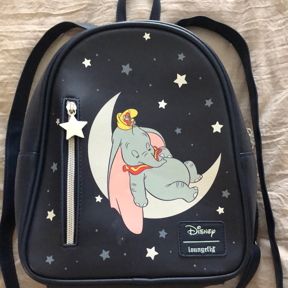 Loungefly Navy Disney’s Slumbering Dumbo surrounded by stars mini backpack